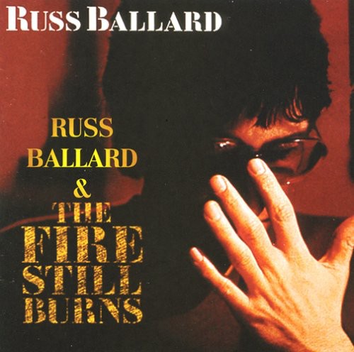 the album cover for Russ Ballard - Fire Still Burns