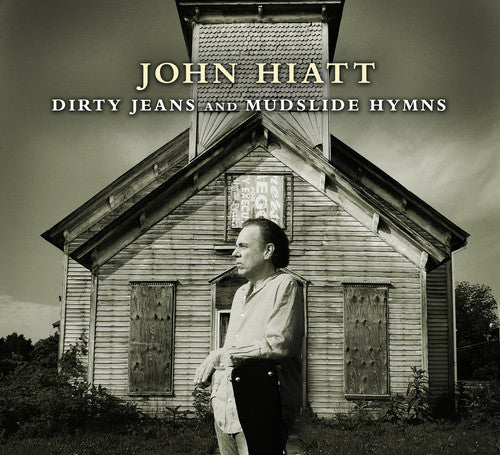 the album cover for John Hiatt - Dirty Jeans and Mudslide Hymns