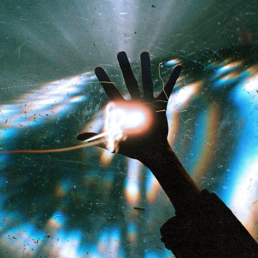 the album cover for Architects - The Sky, The Earth & All Between