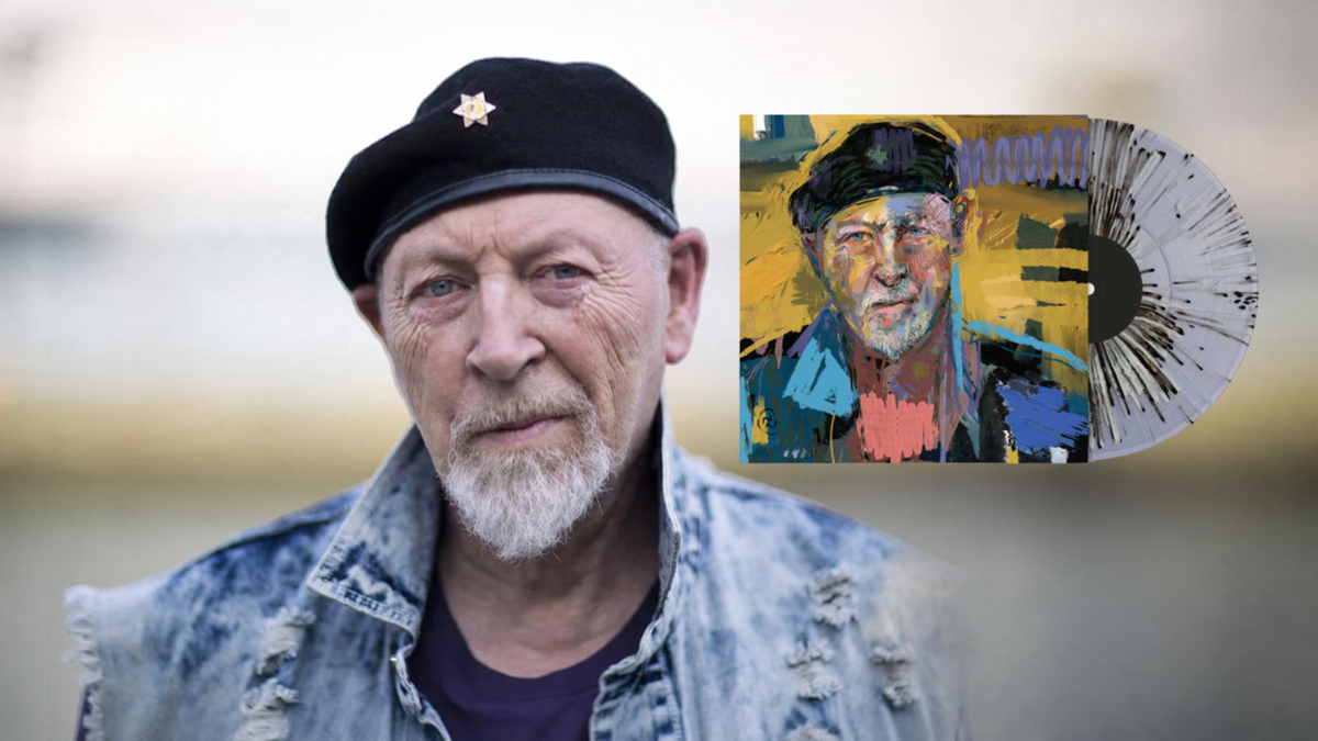 Richard Thompson in a black beret beside the Hippies Thugs and Heroes cover and a splatter vinyl record