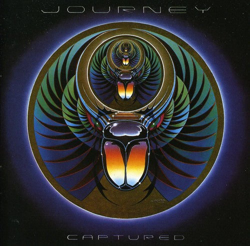 the album cover for Journey - Captured: Live