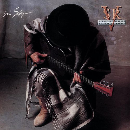 the album cover for Stevie Ray Vaughan & Double Trouble - In Step