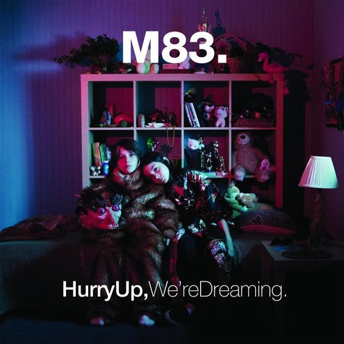 the album cover for M83 - Hurry Up We're Dreaming [Clear Pink & Clear Blue Vinyl]