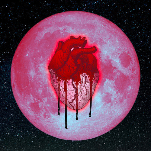 the album cover for Chris Brown - Heartbreak On A Full Moon