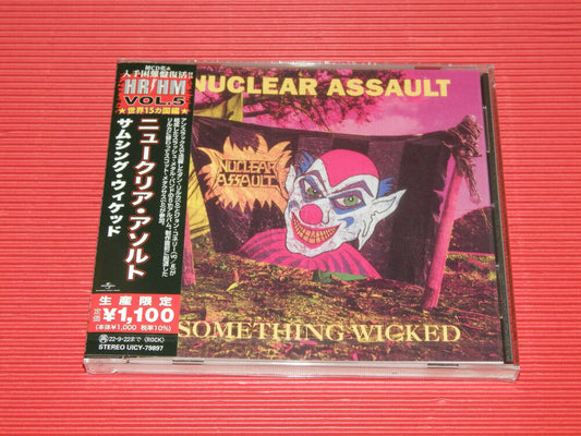 the album cover for Nuclear Assault - Something Wicked [Reissue] (Jpn)