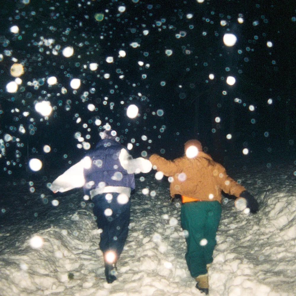 the album cover for Movements - Happier Now [Indie Exclusive Tangerine / Apple Red]