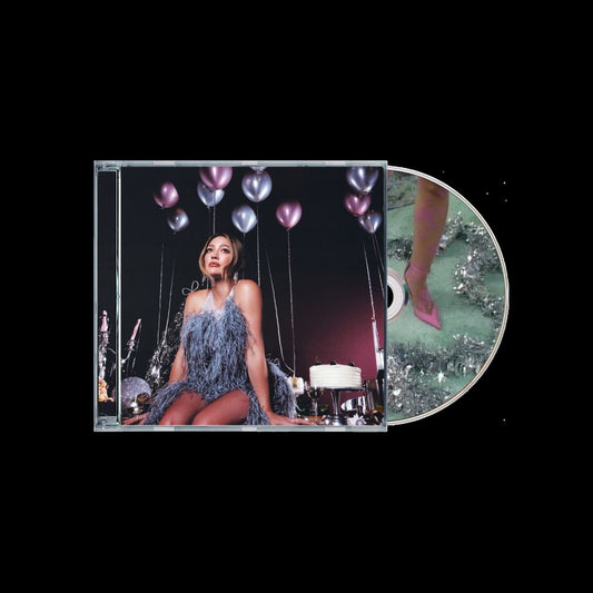 the album cover for Hilary Duff - Holiday Things