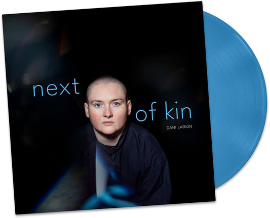 the album cover for Dani Larkin - Next Of Kin - Blue (Blue) [Colored Vinyl]