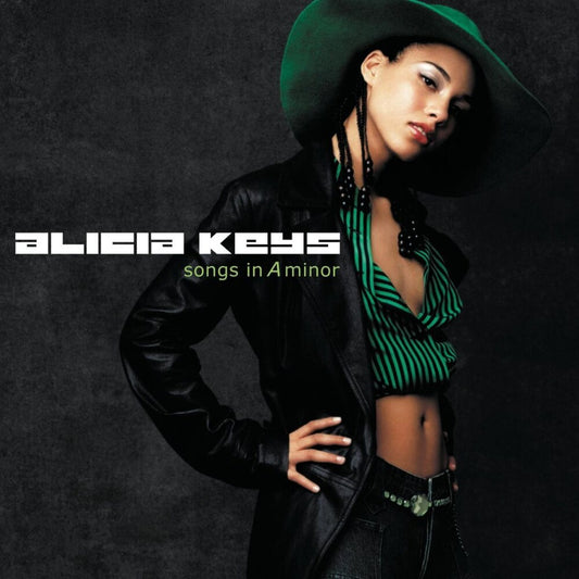 the album cover for Alicia Keys - Songs In A Minor - 25th Anniversary [Translucent Burnt Orange Marbled]