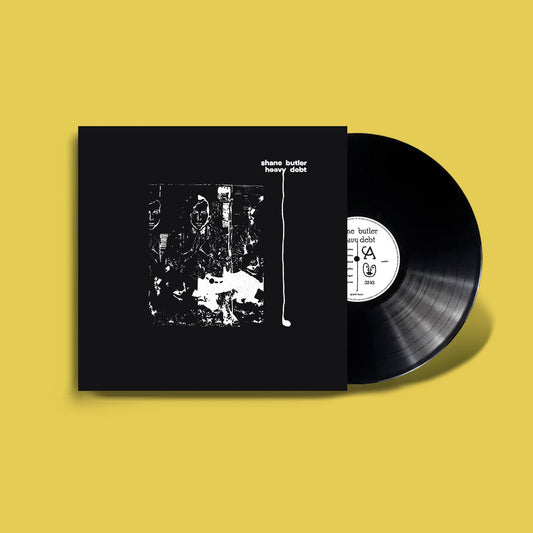 the album cover for Shane Butler - Heavy Debt