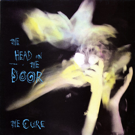 The CURE- HEAD ON THE DOOR